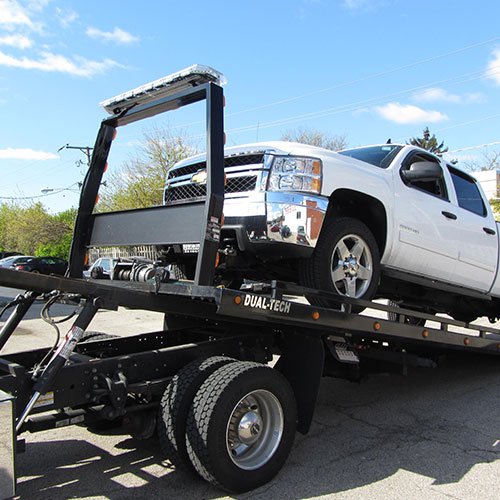 Flatbed truck used for vehicle transport